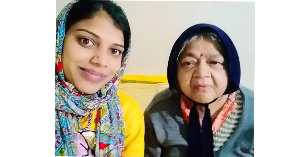 Physical therapist helping patient walk