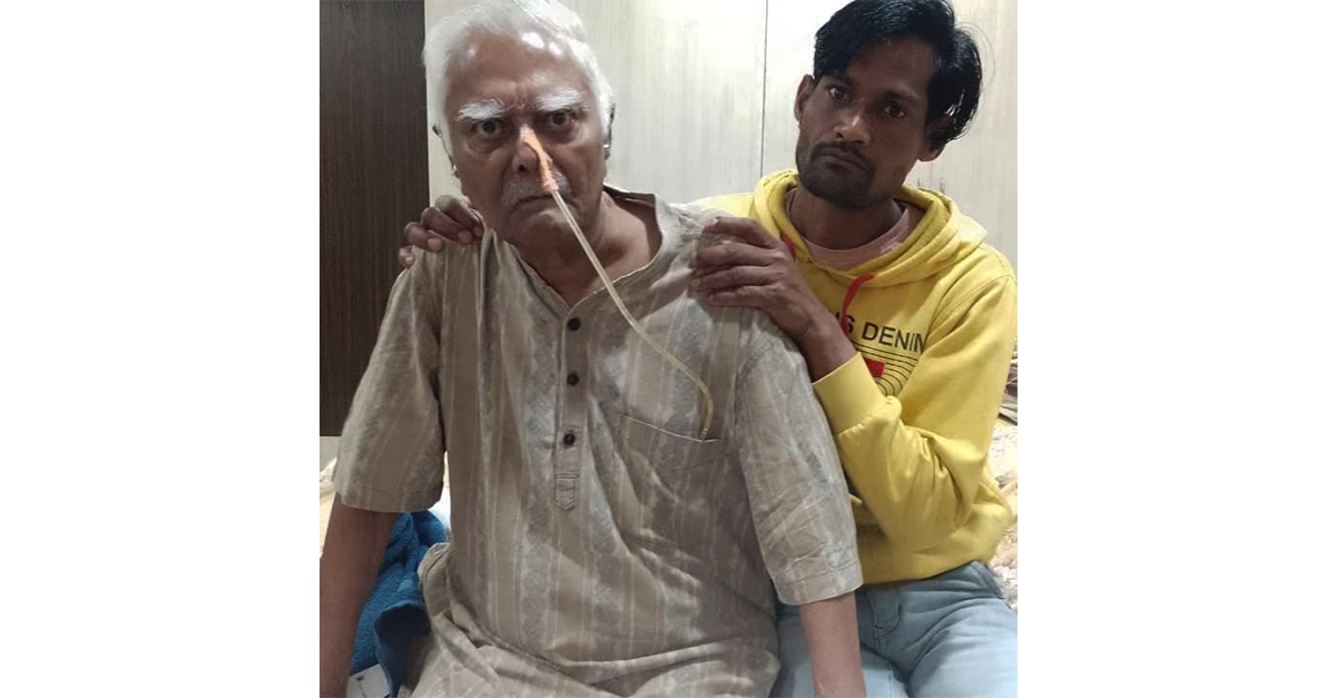 Physical therapist helping patient walk