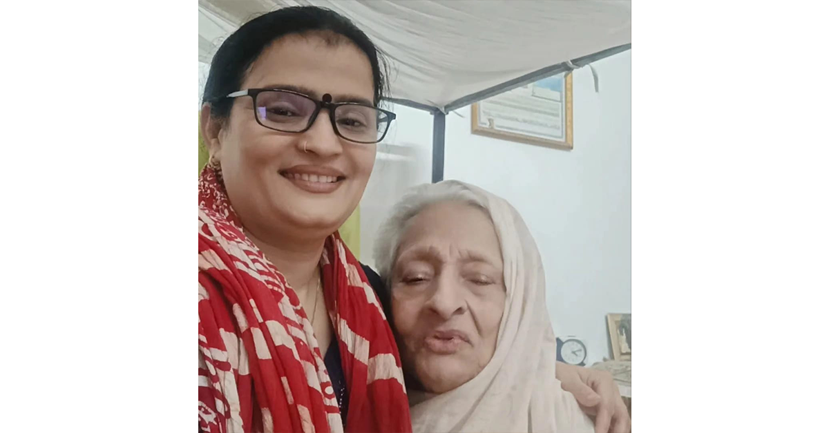 Physical therapist helping patient walk